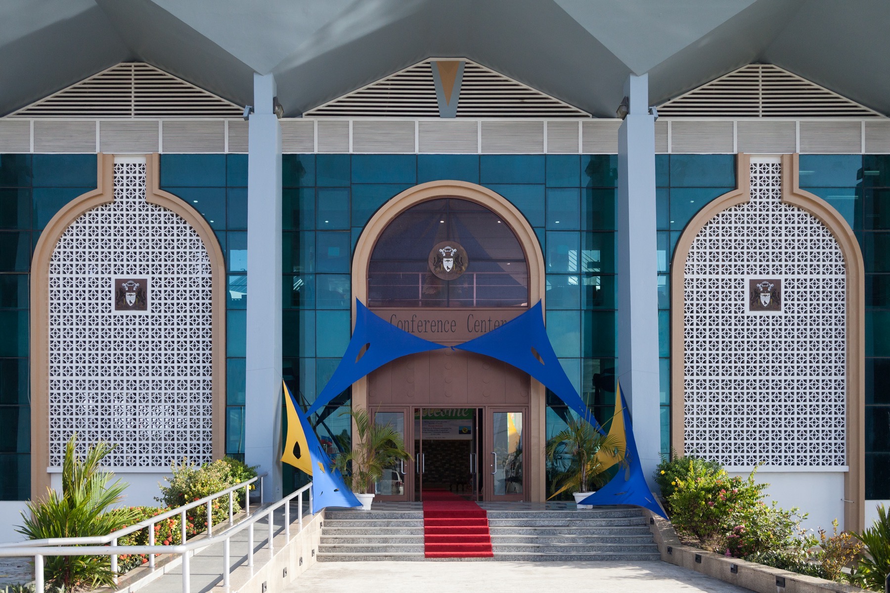 Delegates seated in a plenary session inside the main hall of the Arthur Chung Conference Centre, Georgetown, Guyana
